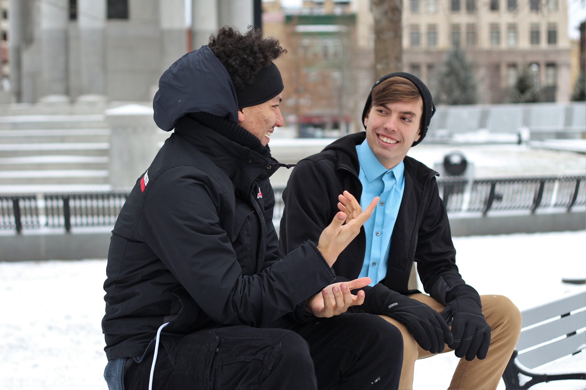 2 Male Friends chatting in winter