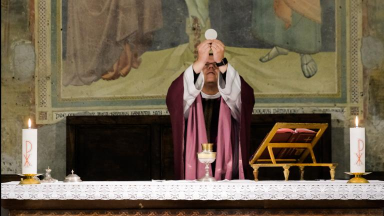 Priest Celebrating Mass (CC0 Josh Applegate on Unsplash)