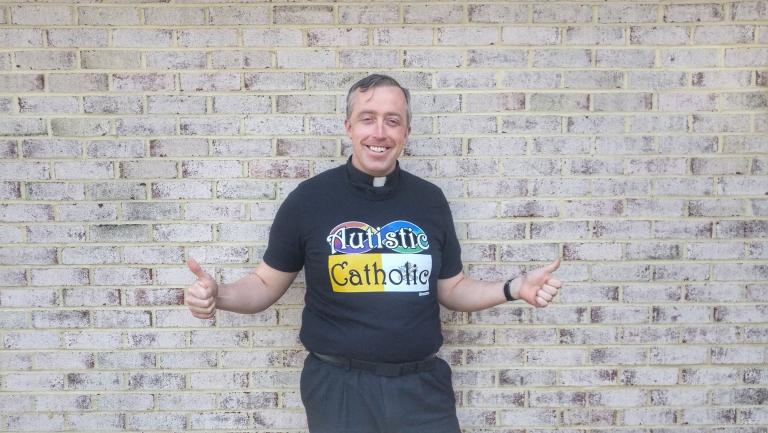 Myself in my Autistic Catholic shirt over clerics