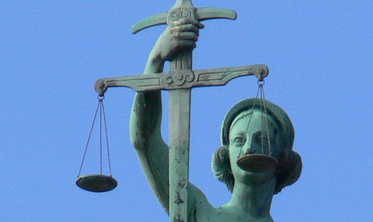 Conscience and Law, detail from the Justicia sculpture on the court house in Bamberg, Bavaria, Germany