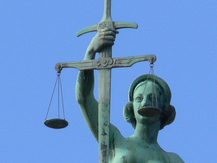 Conscience and Law, detail from the Justicia sculpture on the court house in Bamberg, Bavaria, Germany