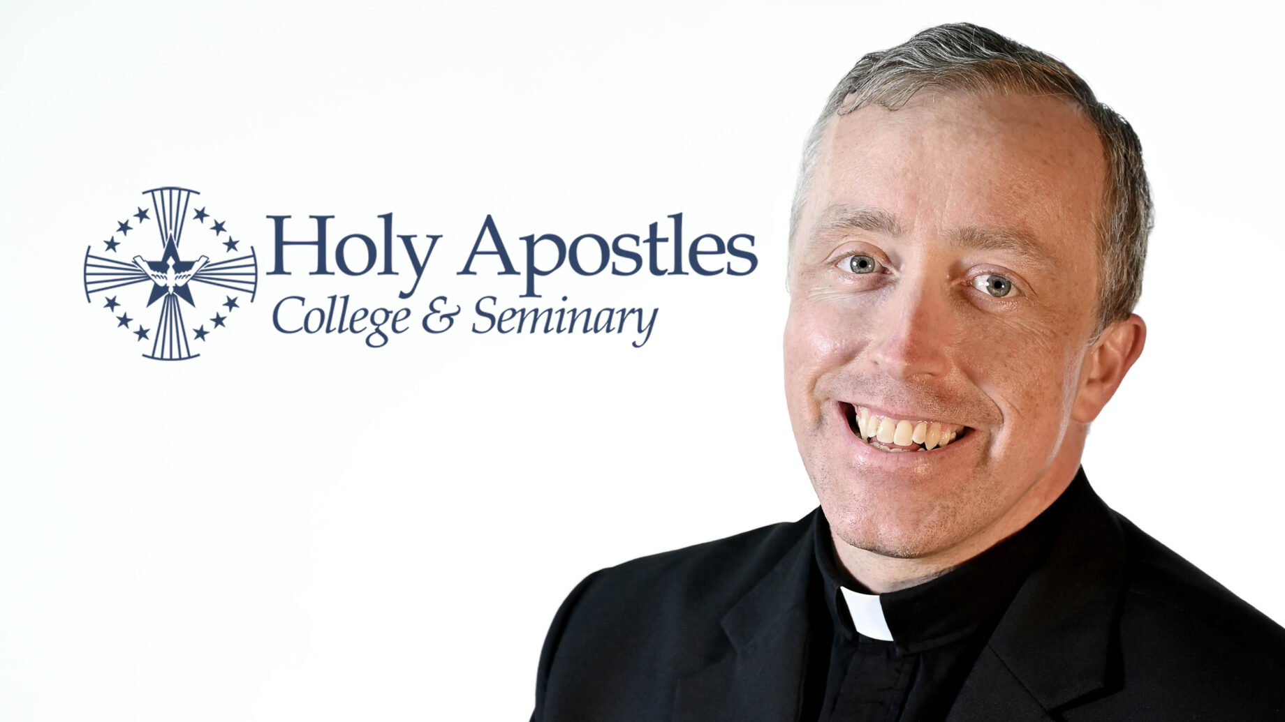 Fr. Matthew Schneider with Holy Apostles logo